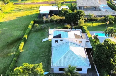 Casa térrea  - condomínio village – com 3 suítes amplas, conceito aberto, fino acabamento - terreno com 1.860 m² com 544m² útil.