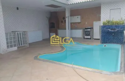 Sobrado com piscina e 3 suítes no embaré – 300 m², 2 vagas e área gourmet