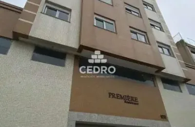 Apartamento com 2 quartos, sendo 1 suíte, no centro