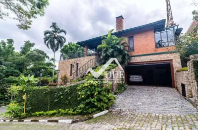 Casa tipo sobrado no morro santa terezinha com 400m² de área construída.