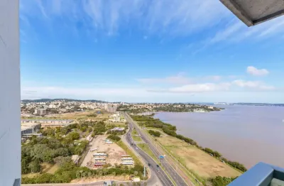 Loft com sacada e vista para o guaíba! andar alto, projeto de arquiteta, marcenaria sob medida e iluminação planejada. condomínio completo com piscina aquecida, academia, sauna, salão de festas e serv