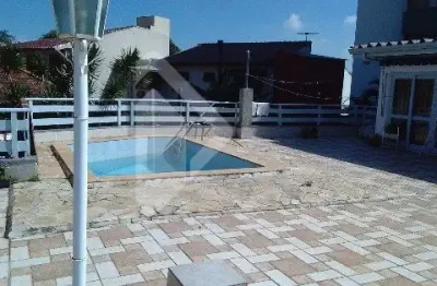 Casa de esquina , residencial ou comercial,com 4 quartos, piscina , garagem, vista, terraço, churrasqueira