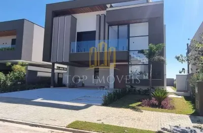 Sua nova vida comeca aqui – mansao espetacular no alphaville com vista para as montanhas!   bem-vindo ao seu novo lar, onde sofisticacao, conforto e natureza se encontram em perfeita harmonia. localiz