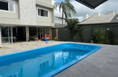 Casa com 3 quartos para alugar na Avenida Paranaguá, 418, Caiobá, Matinhos