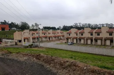 Casa-sobrado geminado com 3 dormitórios em condomínio fechado