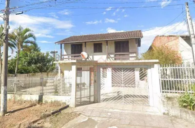 Sobrado em boa localização, com edícula e pátio murado