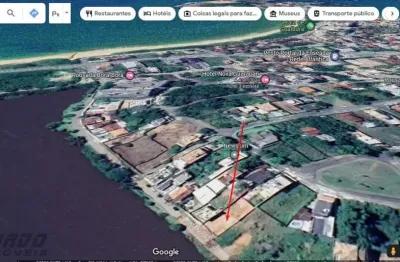 Terreno / lote murando à venda com 360 m² em nova guarapari-es, frente lagoa.