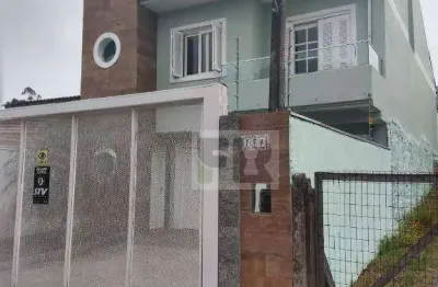 Ótimo sobrado com 3 dormitórios sendo 2 suítes á venda no bairro moradas do bosque em cachoeirinha rs.