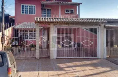 Excelente sobrado de 4 dorm. c/ 3 vagas de garagem, porto verde, alvorada/rs.