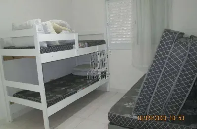 Apartamento 1 dormitório, sala com sacada e cozinha americana.