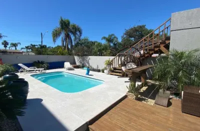 Casa em condomínio fechado com 3 quartos à venda na primavera, 921, atlântida, xangri-lá por r$ 1.390.000