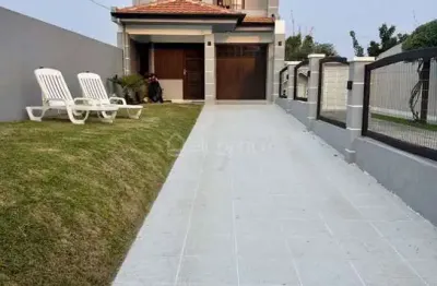 Sobrado mobiliado a venda no centro de xangri-lá próximo ao mar.