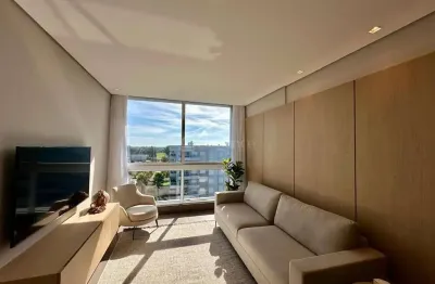 Apartamento mobiliado e decorado à venda no edifício livin na avenida central de atlântida.