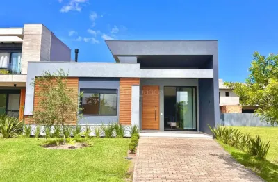 Casa à venda no condomínio sunset com quatro dormitórios à venda em xangri-lá.