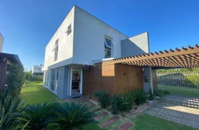 Casa em condomínio fechado com 3 quartos à venda na avenida jaçanã, 1100, atlântida, xangri-lá por r$ 1.170.000