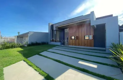 Casa próximo ao mar com quatro suítes à venda no centro de xangri-lá.