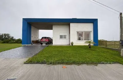 Casa em condomínio fechado com 3 quartos à venda na rs 389, estrada do mar, 27, santorini, xangri-lá por r$ 850.000
