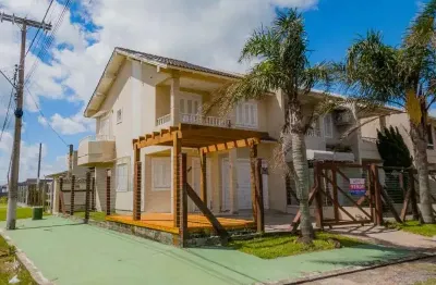 Sobrado 3 dormitórios á venda em tramandaí, próximo ao mar.