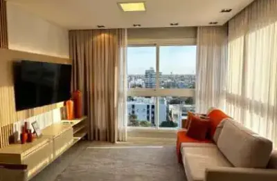 Apartamento mobiliado com suíte no centro de tramandaí