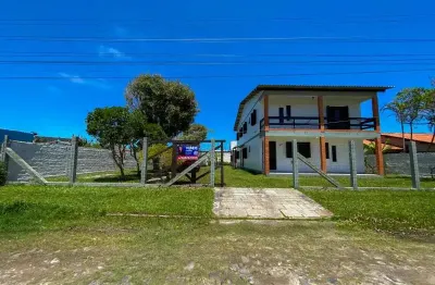 Sobrado com 3 apartamentos + anexo em 2 terrenos na zona nova em tramandaí