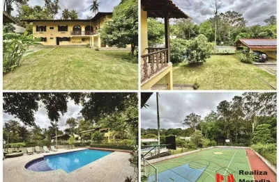 Cond. parque do refúgio - 2.900 m² de terreno, 5 suítes, piscina, quadra, amplos jardins com pomar!