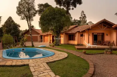 Casa com 6 quartos à venda na villagio, 1140, mato queimado, gramado por r$ 2.150.000