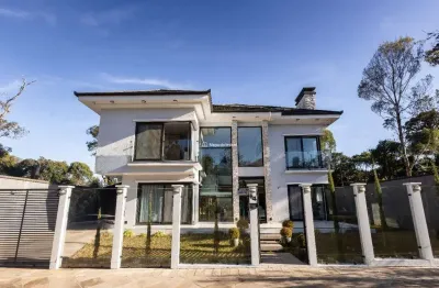Casa em condomínio fechado com 4 quartos à venda na cerejeira, 64, vivendas do arvoredo, gramado por r$ 4.000.000