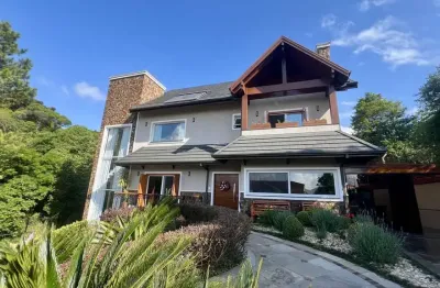 Casa com 4 quartos à venda na gralha azul, 111, avenida central, gramado por r$ 5.150.000