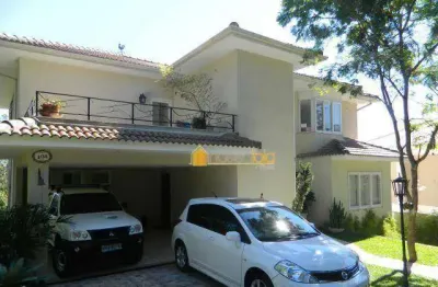 Linda residência no condomínio chácara ubá. terreno com 700 m², varandas, 2 salas, 3 quartos, 3 suítes, copa cozinha, área e 4 vagas.