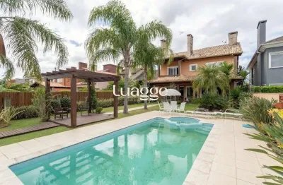 Casa em condomínio fechado com 4 quartos à venda na Avenida Juca Batista, 9071, Belém Novo, Porto Alegre