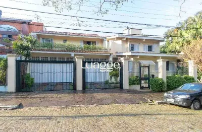 Casa para venda - 420m², 5 dormitórios, sendo 2 suites, 6 vagas - nonoai