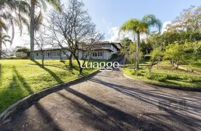 Casa condomínio a venda - 5 dormitórios, sendo 2 suítes, a master com lareira, 4 vagas - cavalhada