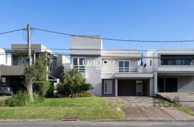 Casa em condomínio fechado com 4 quartos à venda na Avenida Juca Batista, 9087, Belém Novo, Porto Alegre