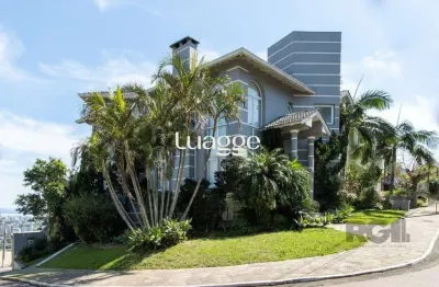 Casa em condomínio fechado com 4 quartos à venda na Rua Alcebíades Antônio dos Santos, 444, Nonoai, Porto Alegre