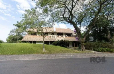Casa em condomínio fechado com 6 quartos à venda na Avenida da Cavalhada, 5302, Cavalhada, Porto Alegre