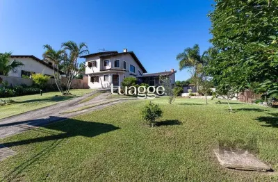 Casa com 3 quartos à venda na Rua Flor de Pessegueiro, 202, Vila Nova, Porto Alegre