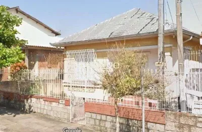 Casa com 4 quartos à venda na Rua Coronel Jaime da Costa Pereira, 248, Partenon, Porto Alegre