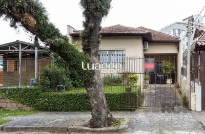 Casa térrea, 2 quartos, 2 vagas, edicula com 1 quarto e um banheiro - bairro tristeza