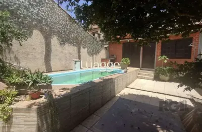Casa com 4 quartos à venda na Rua Laguna, 264, Cavalhada, Porto Alegre