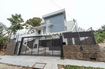 Casa com 3 quartos à venda na Rua Professor Emílio Meyer, 277, Vila Conceição, Porto Alegre
