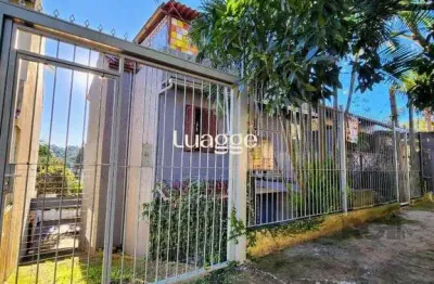 Casa com 4 quartos à venda na Rua Oscar Tollens, 157, Santa Tereza, Porto Alegre