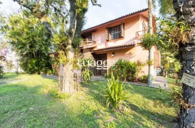Casa com 4 quartos à venda na Rua Itapitocaí, 794, Cristal, Porto Alegre