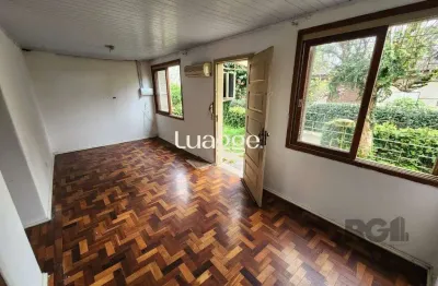 Casa em condomínio fechado com 3 quartos à venda na Rua Butuí, 763, Cristal, Porto Alegre