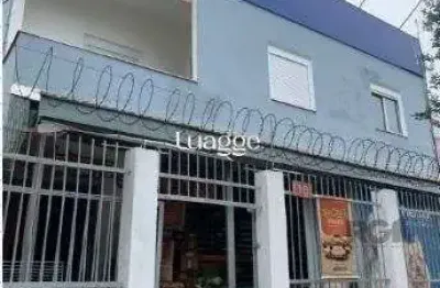 Casa com 3 quartos à venda na Rua Ventos do Sul, 95, Vila Nova, Porto Alegre