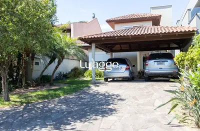 Casa em condomínio fechado com 3 quartos à venda na Avenida Juca Batista, 8053, Belém Novo, Porto Alegre