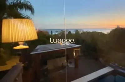 Casa com 4 quartos à venda na Rua Bororó, 251, Vila Assunção, Porto Alegre