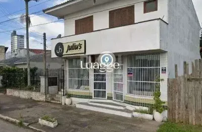 Apartamento de frente com 1 dormitório, sala, cozinha e sacada.