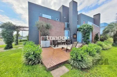 Excelente sobrado de esquina, com vista para o lago, próximo ao clube social, no condomínio acqualina beach, localizado na praia de maristela , em xangri-la,. possui 4 dormitórios, sendo 3 suítes,