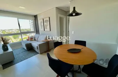 Apartamento com dois dormitórios no edificio delpaine em capao da canoa