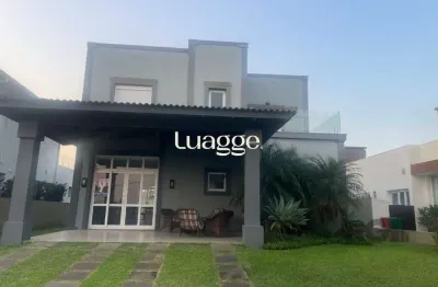 Casa em condomínio fechado com 3 quartos à venda na Rua Rio Novo, 2173, Atlântida, Xangri-Lá